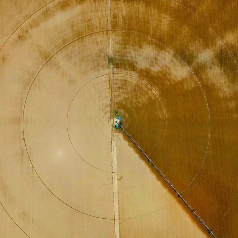 Aerial view of a circular crop field irrigated by a Skief center pivot